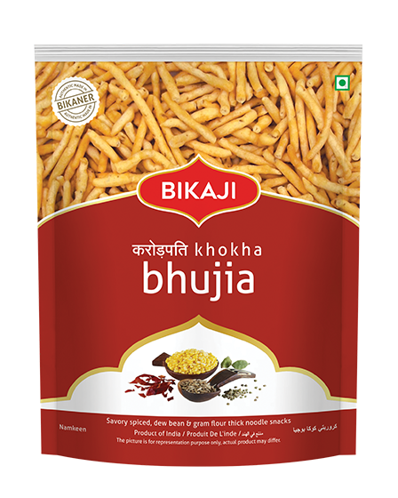 Front view of Bikaji Karodpati Khokha Bhujia namkeen pouch (red pack) showing thick gram flour noodles with traditional spices.