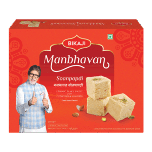 Bikaji Manbhavan Soanpapdi 500g box front and back view with pista and almond flavored flaky sweet pieces