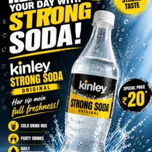 Kinley Strong Soda original bottle placed on desk with documents, clear carbonated soda drink in plastic bottle